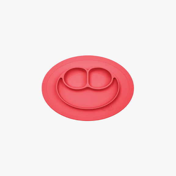The Mini Mat in Coral by ezpz / Self-Suctioning Silicone Plate + Placemat #color_coral