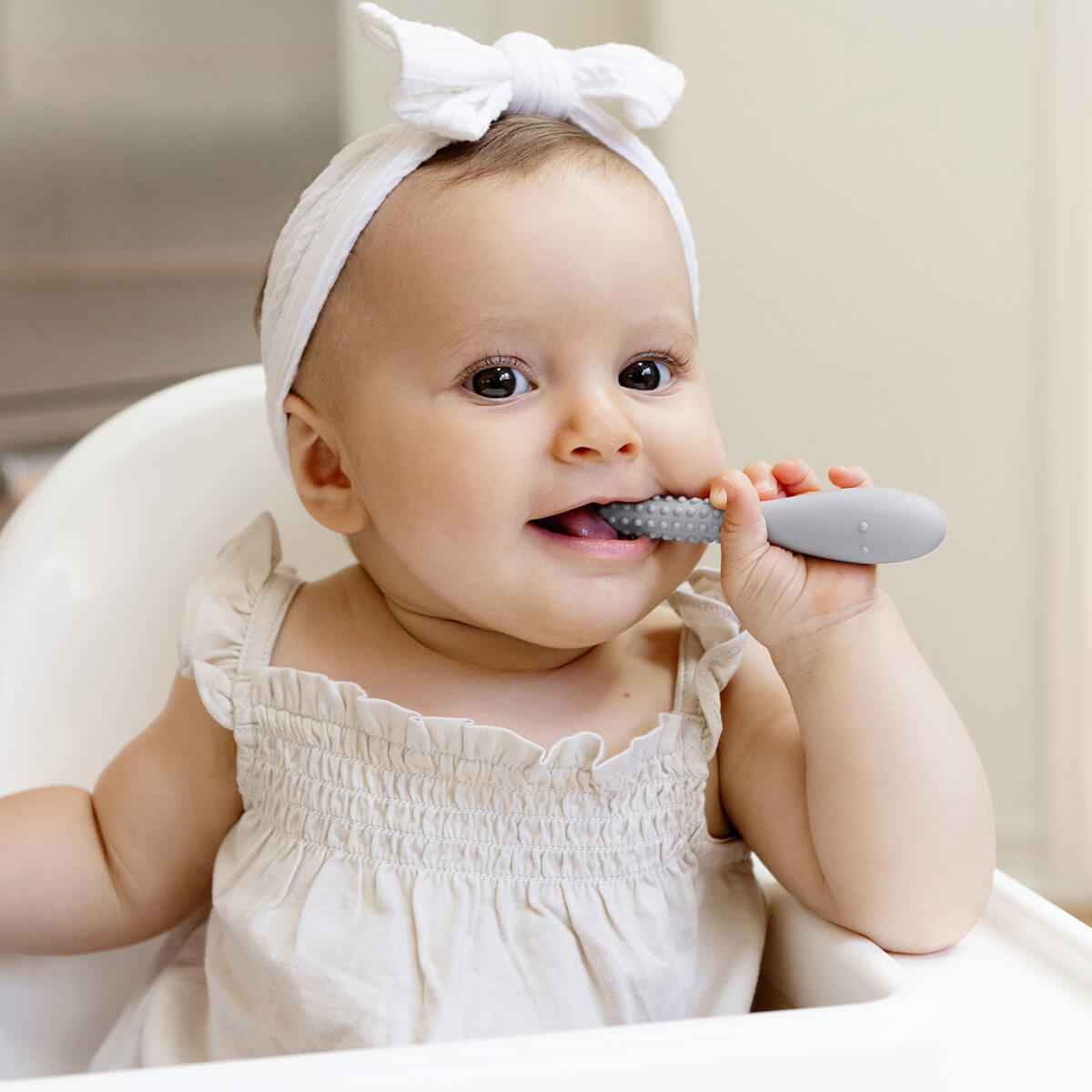 Pre-feeding set by ezpz in pewter light gray includes the tiny pops and oral development tools (silicone teethers) #color_pewter