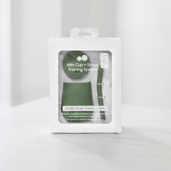 The Mini Cup + Straw in Olive by ezpz / Silicone Drinking Cup and Straw Training System for Toddlers #color_olive