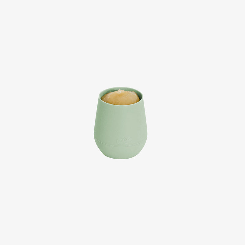 The Tiny Cup in Sage by ezpz / Open-Top, Silicone Drinking Cup for Babies #color_sage