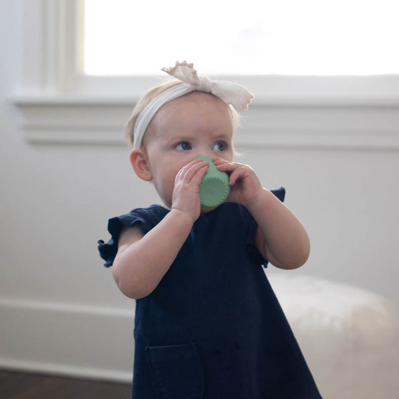 The Tiny Cup in Sage by ezpz / Open-Top, Silicone Drinking Cup for Babies #color_sage