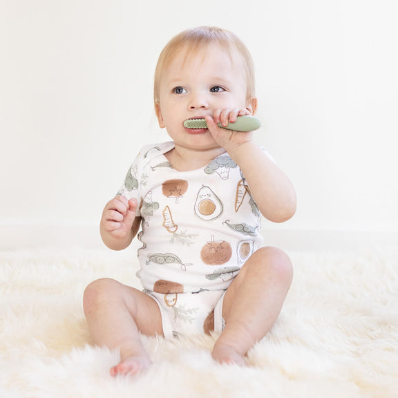 ezpz baby led toothbrush and sensory tongue depressor in sage green #color_sage