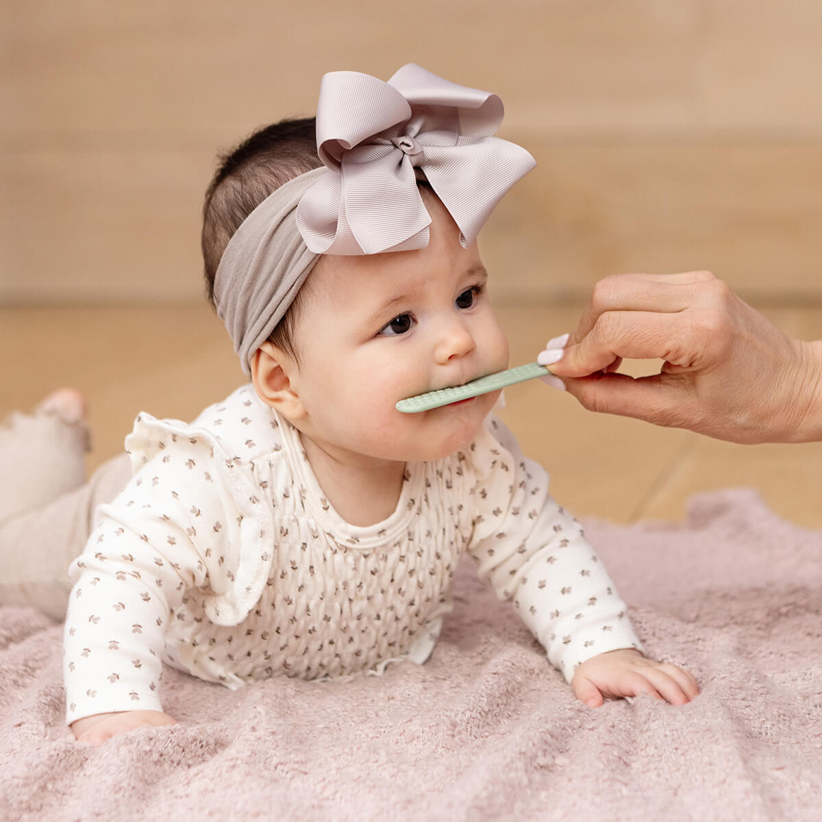 ezpz baby led toothbrush and sensory tongue depressor in sage green #color_sage