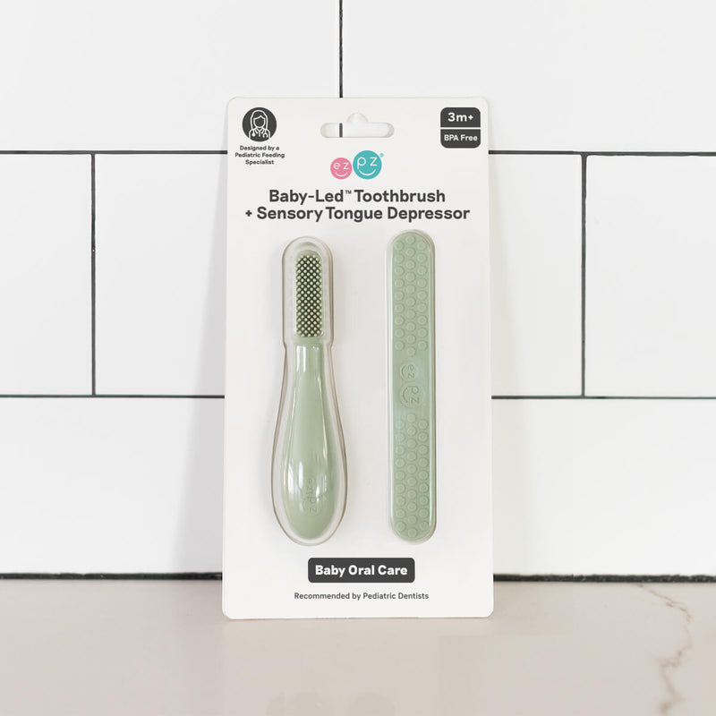 ezpz baby led toothbrush and sensory tongue depressor in sage green #color_sage