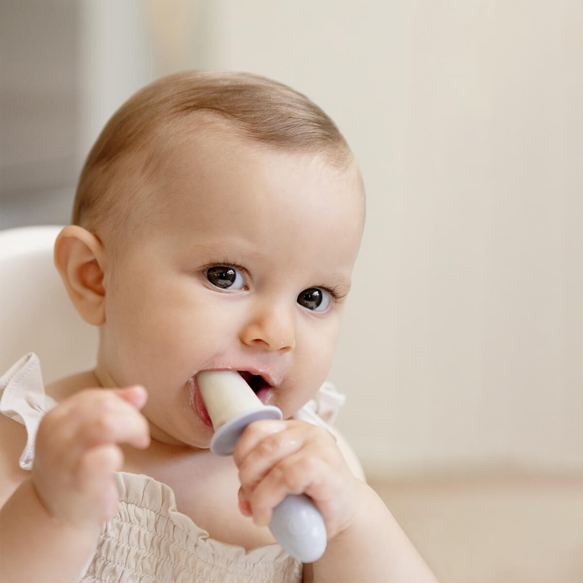 Pre-feeding set by ezpz in pewter light gray includes the tiny pops and oral development tools (silicone teethers) #color_pewter