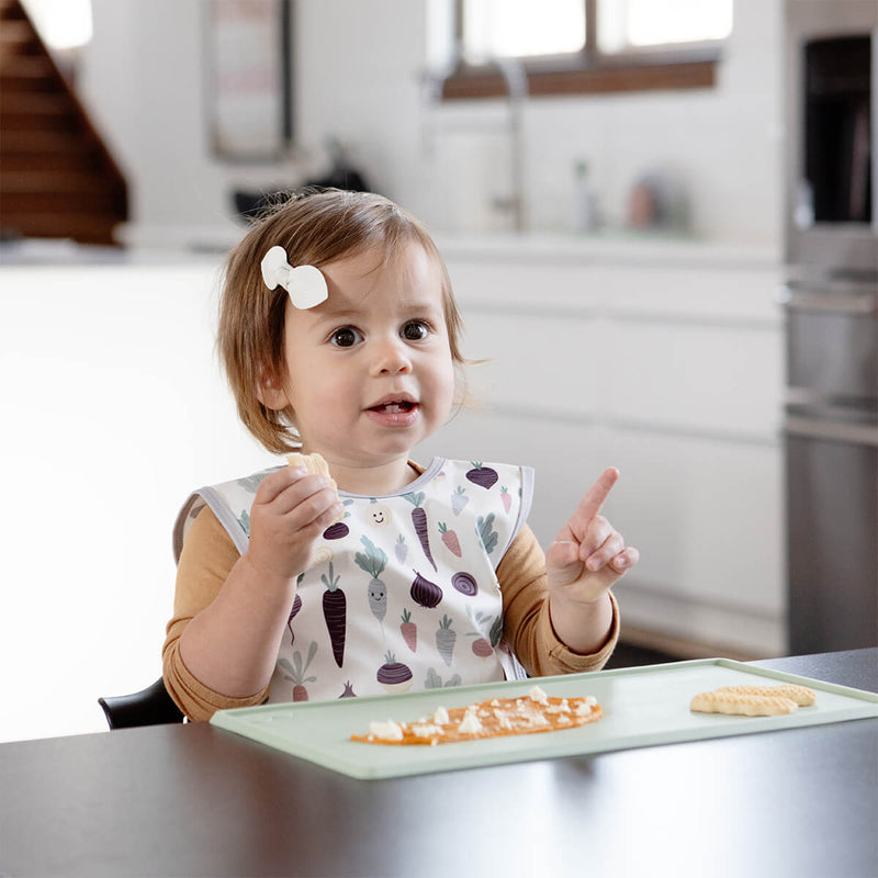 The Tiny Placemat in Sage is a non-slip, silicone placemat that fits on most highchair trays #color_sage / Tiny Placemat – On-the-Go Mealtime Mat for Babies & Toddlers