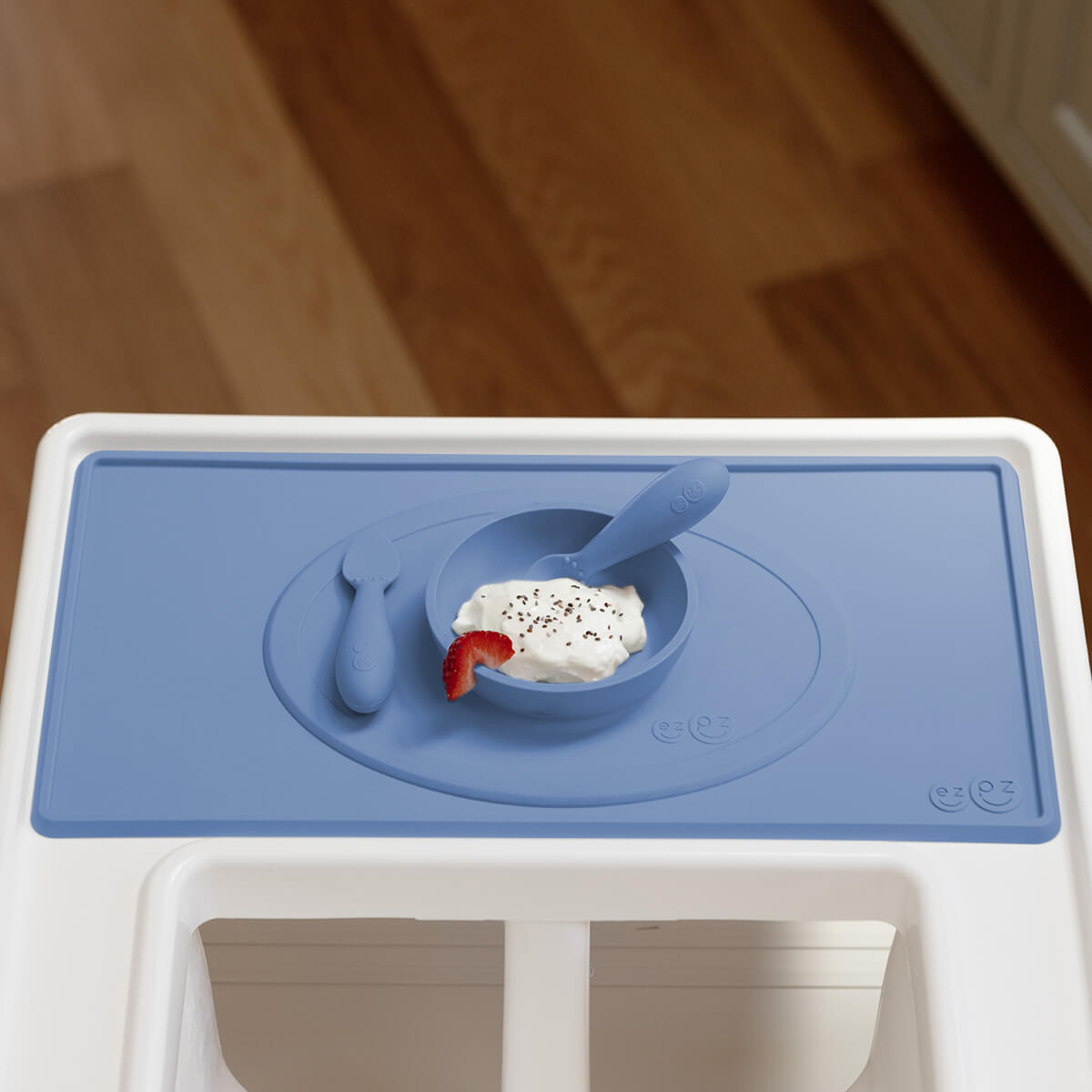 The Tiny Placemat in Indigo is a non-slip, silicone placemat that fits on most highchair trays #color_indigo / Tiny Placemat – On-the-Go Mealtime Mat for Babies & Toddlers