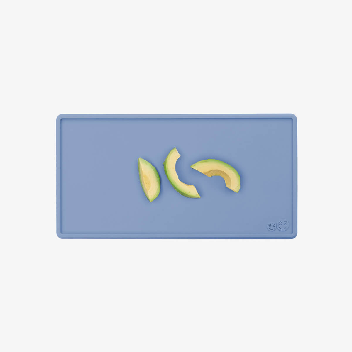 The Tiny Placemat in Indigo is a non-slip, silicone placemat that fits on most highchair trays #color_indigo / Tiny Placemat – On-the-Go Mealtime Mat for Babies & Toddlers