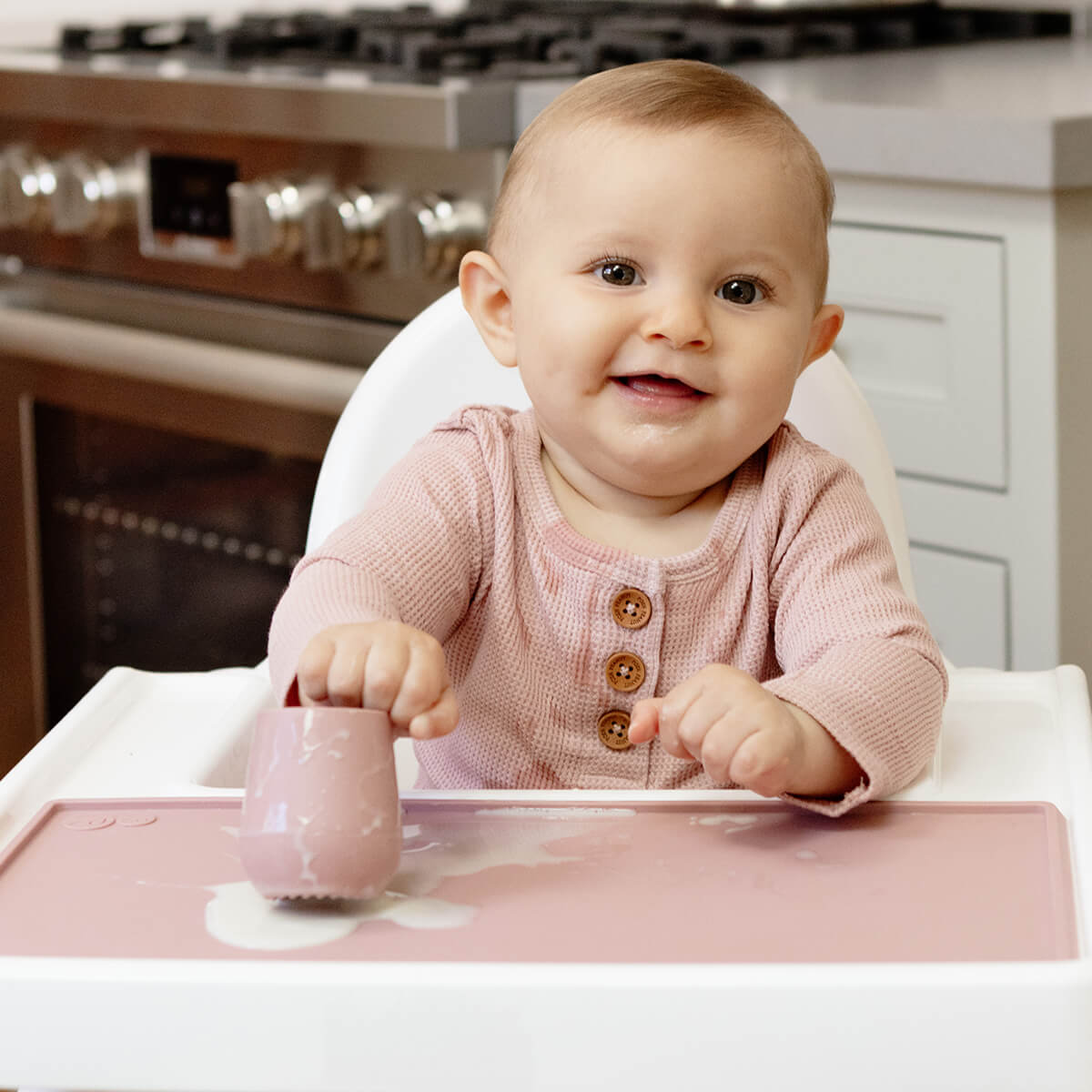 The Tiny Placemat in Blush is a non-slip, silicone placemat that fits on most highchair trays #color_blush / Tiny Placemat – On-the-Go Mealtime Mat for Babies & Toddlers