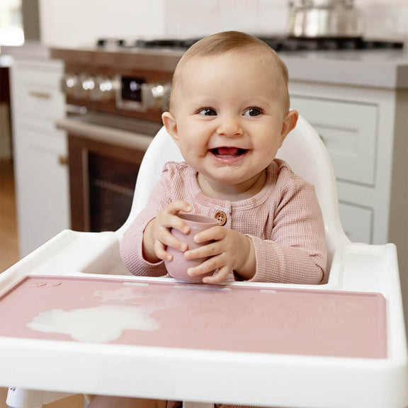 The Tiny Placemat in Blush is a non-slip, silicone placemat that fits on most highchair trays #color_blush  Tiny Placemat – On-the-Go Mealtime Mat for Babies & Toddlers