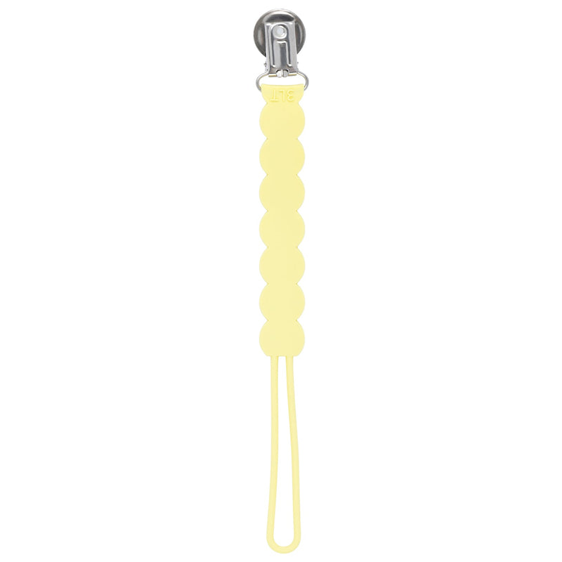 Three Little Tots baby yellow all silicone one piece pacifier clip. This paci clip is flexible and easy to clean