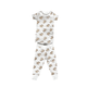 Toddler wearing "Aw Shucks" oyster-themed pajamas, smiling and holding a toy oyster, on a white background.