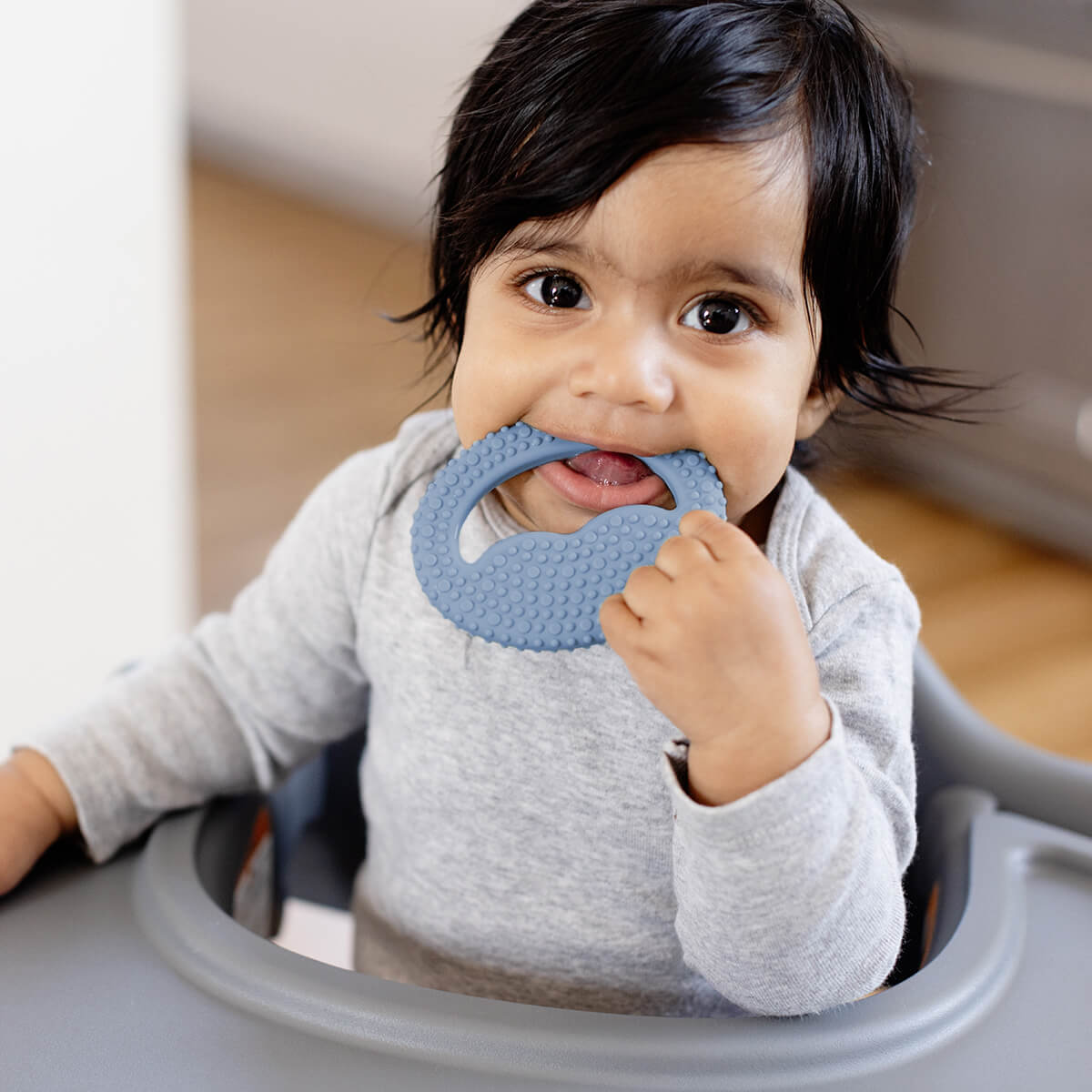 Pre-feeding set by ezpz in indigo blue includes the tiny pops (popsicle molds) and oral development tools (silicone teethers) #color_indigo