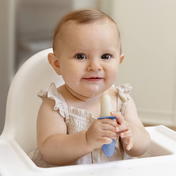 Pre-feeding set by ezpz in indigo blue includes the tiny pops (popsicle molds) and oral development tools (silicone teethers) #color_indigo