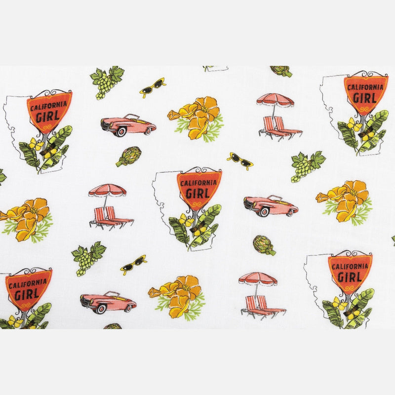 Gift set with a California-themed muslin swaddle blanket and burp cloth/bib combo, featuring vibrant coastal designs.