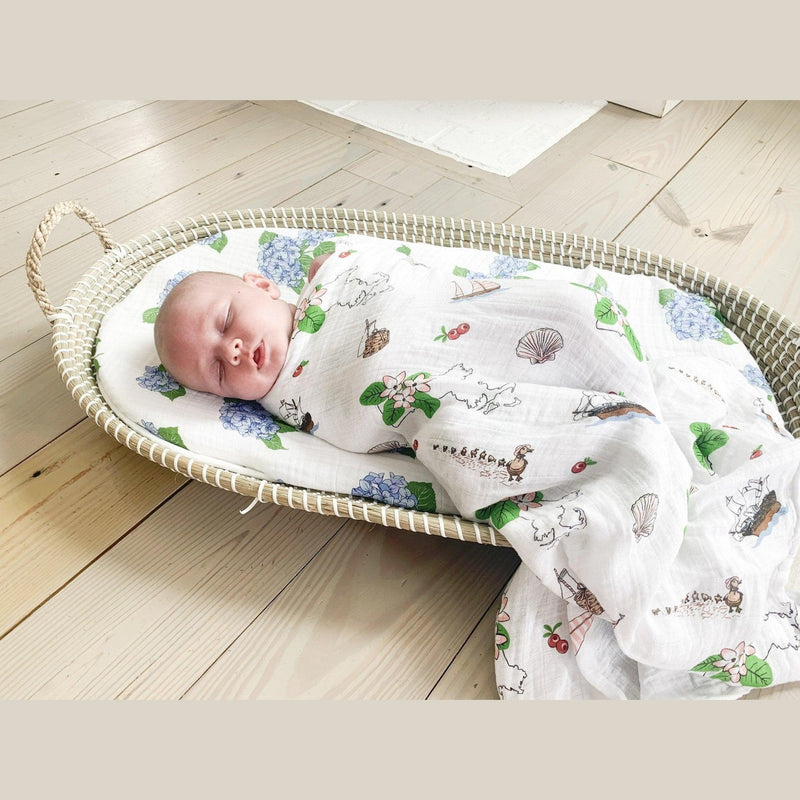 Massachusetts-themed baby swaddle and burp cloth set with floral designs, featuring state map and landmarks.