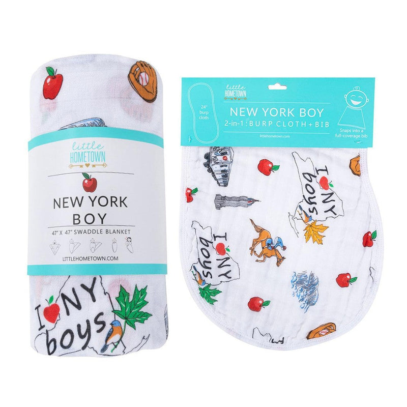 Blue and white muslin swaddle blanket and burp cloth set with New York-themed illustrations for baby boys.