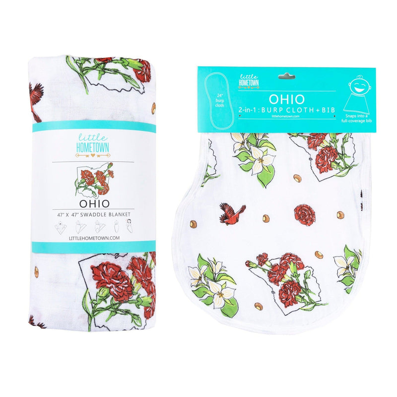 Ohio-themed baby gift set with floral muslin swaddle, receiving blanket, and burp bib, neatly arranged.