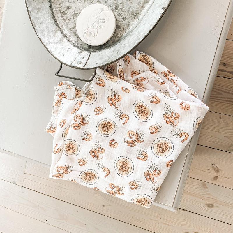 Gift set with shrimp and grits-themed baby muslin swaddle blanket and burp cloth/bib combo, Little Hometown.
