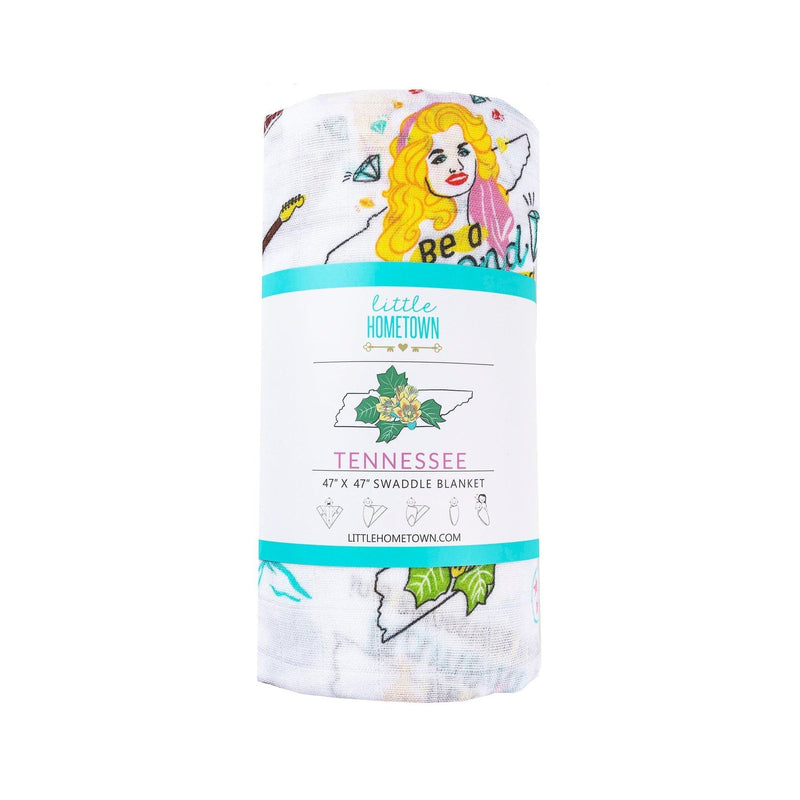 Floral-themed muslin swaddle blanket and burp cloth set, featuring delicate pink and green flower patterns.