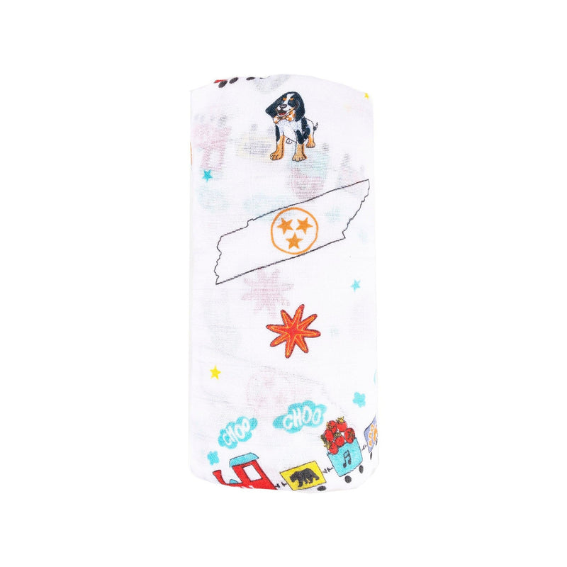 Tennessee-themed baby gift set with muslin swaddle blanket and burp cloth/bib combo, featuring state icons.